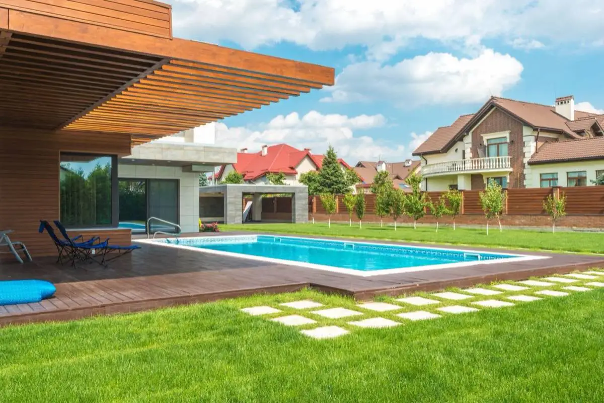 Pebble interior finish on a backyard swimming pool in Port St. Lucie, FL